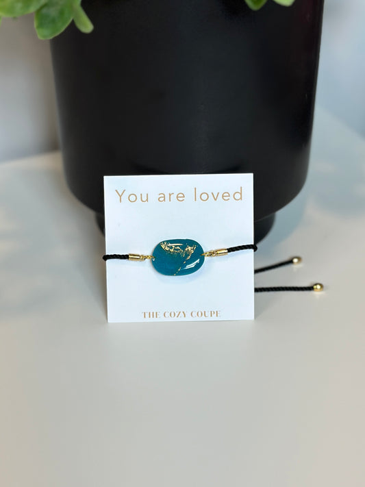 Teal and gold bracelet